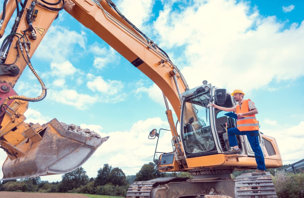 inspecting excavator for sale