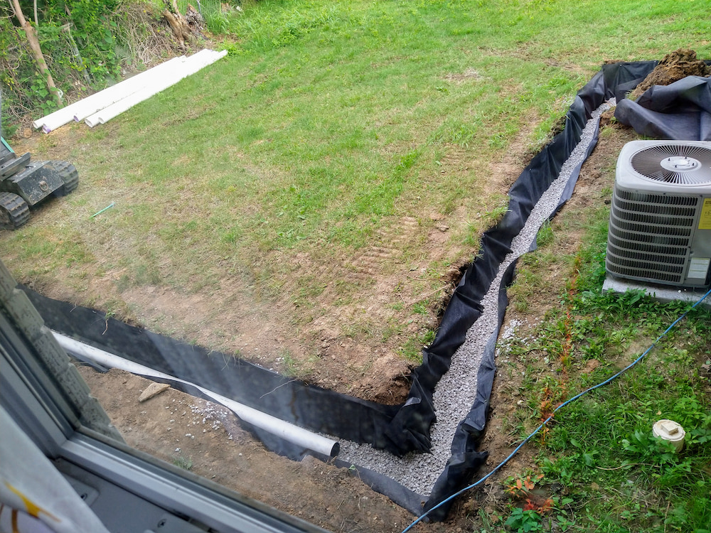 french drain bottom layer fill