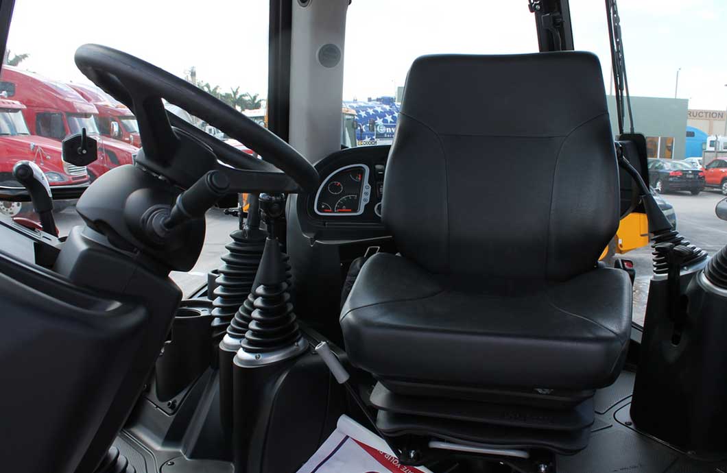 how to operate a backhoe
