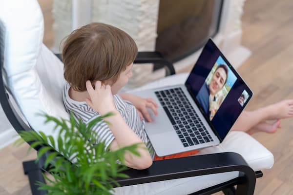 child video conferencing with man