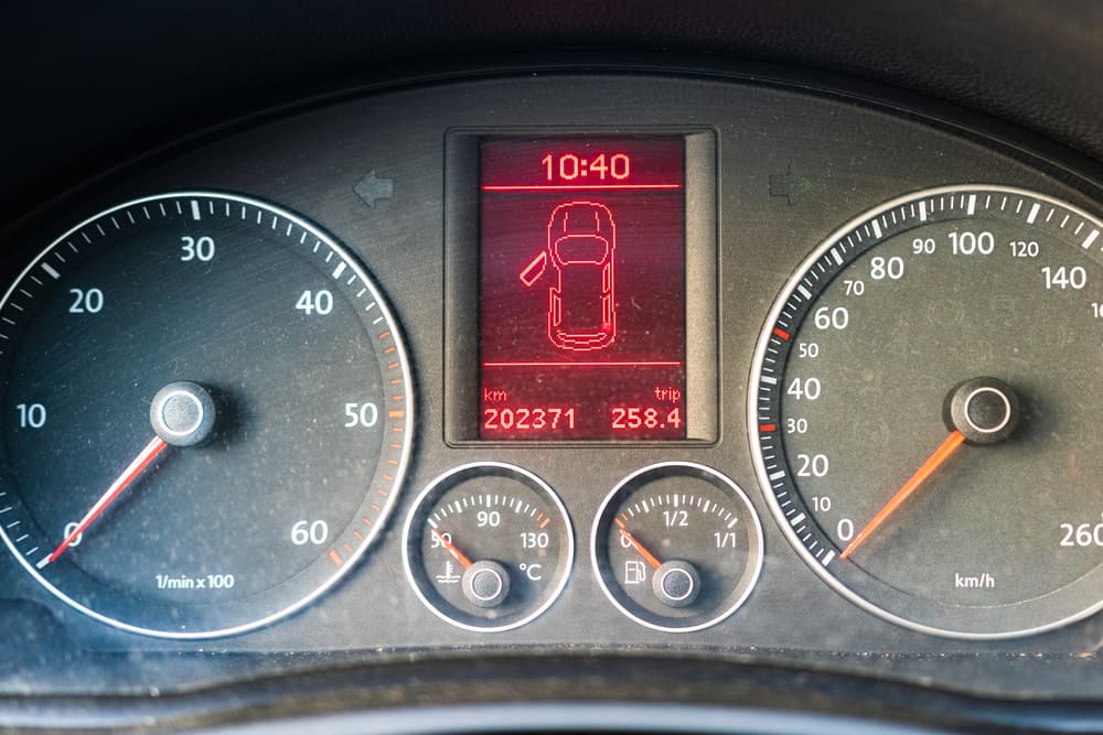older car odometer in kilometers