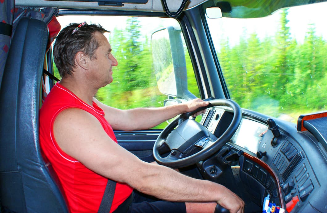 truck driver happily driving