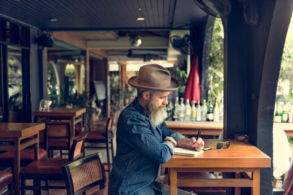 truck driver writing in a journal