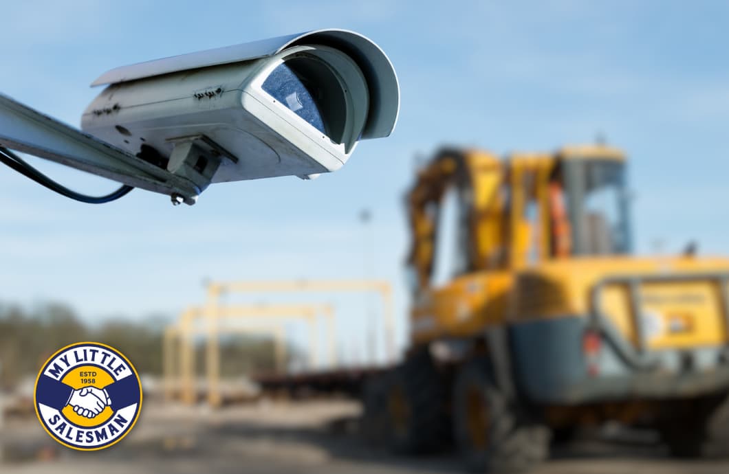 secure construction equipment lot with surveillance camera