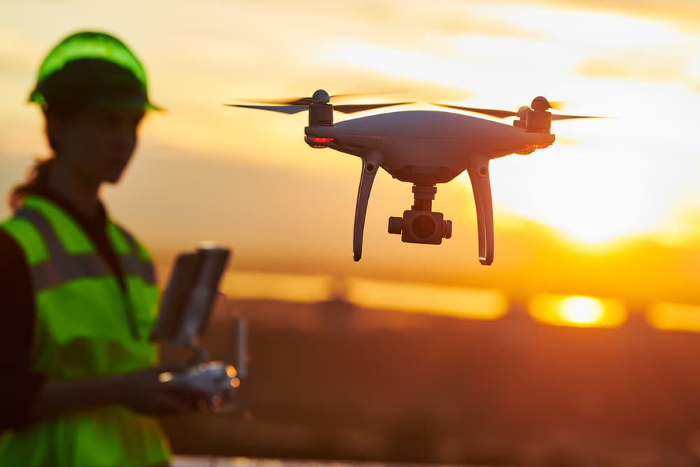 drone flying over construction site